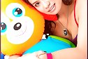 Busty Angelena Loly poses with stuffed toy and plays with toy