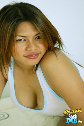 Busty chubby Aom stripping and spreading her legs nude