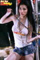 Mei mei playing with metal chain in top wearing denim shorts